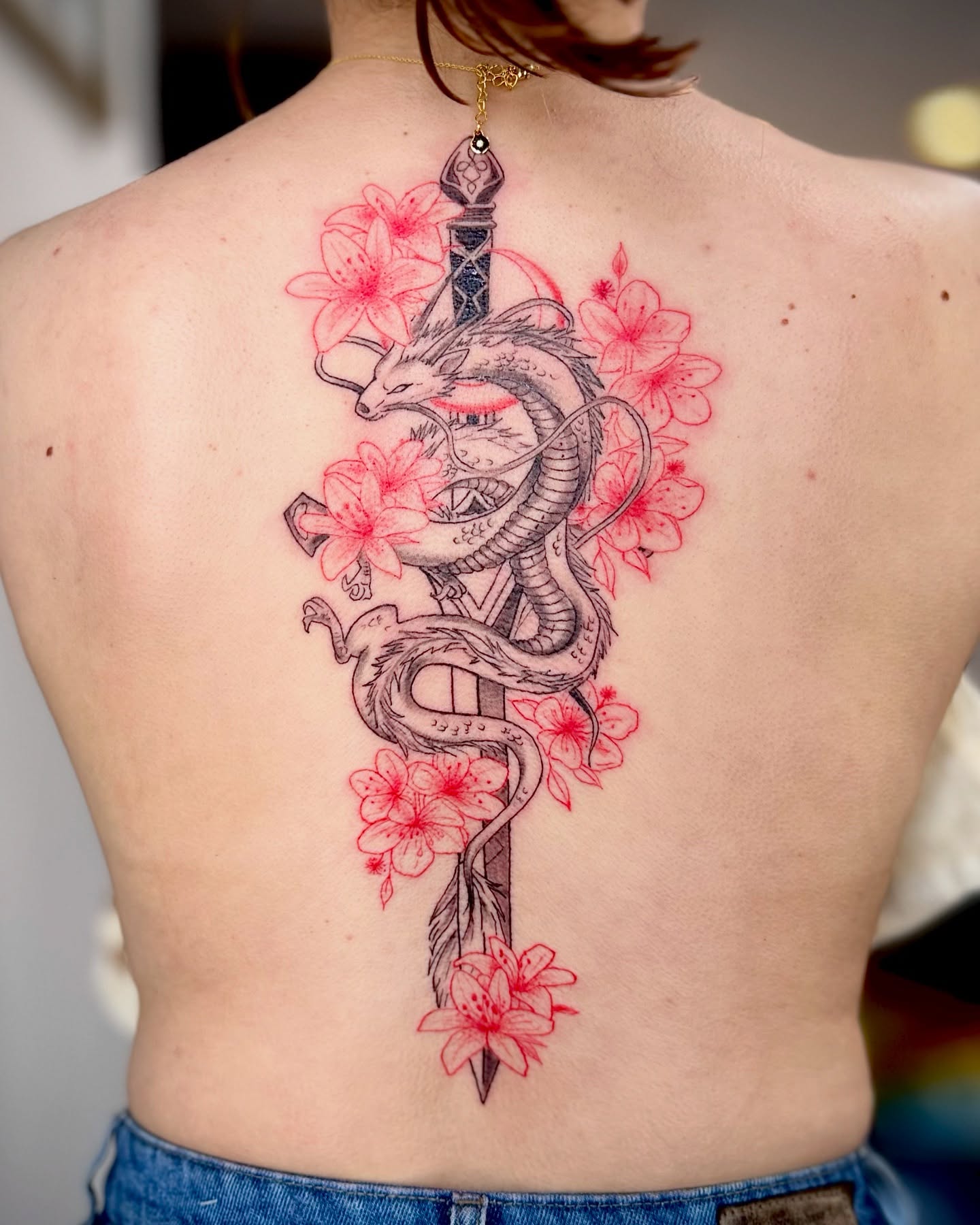 Dragon and cherry blossom back tattoo