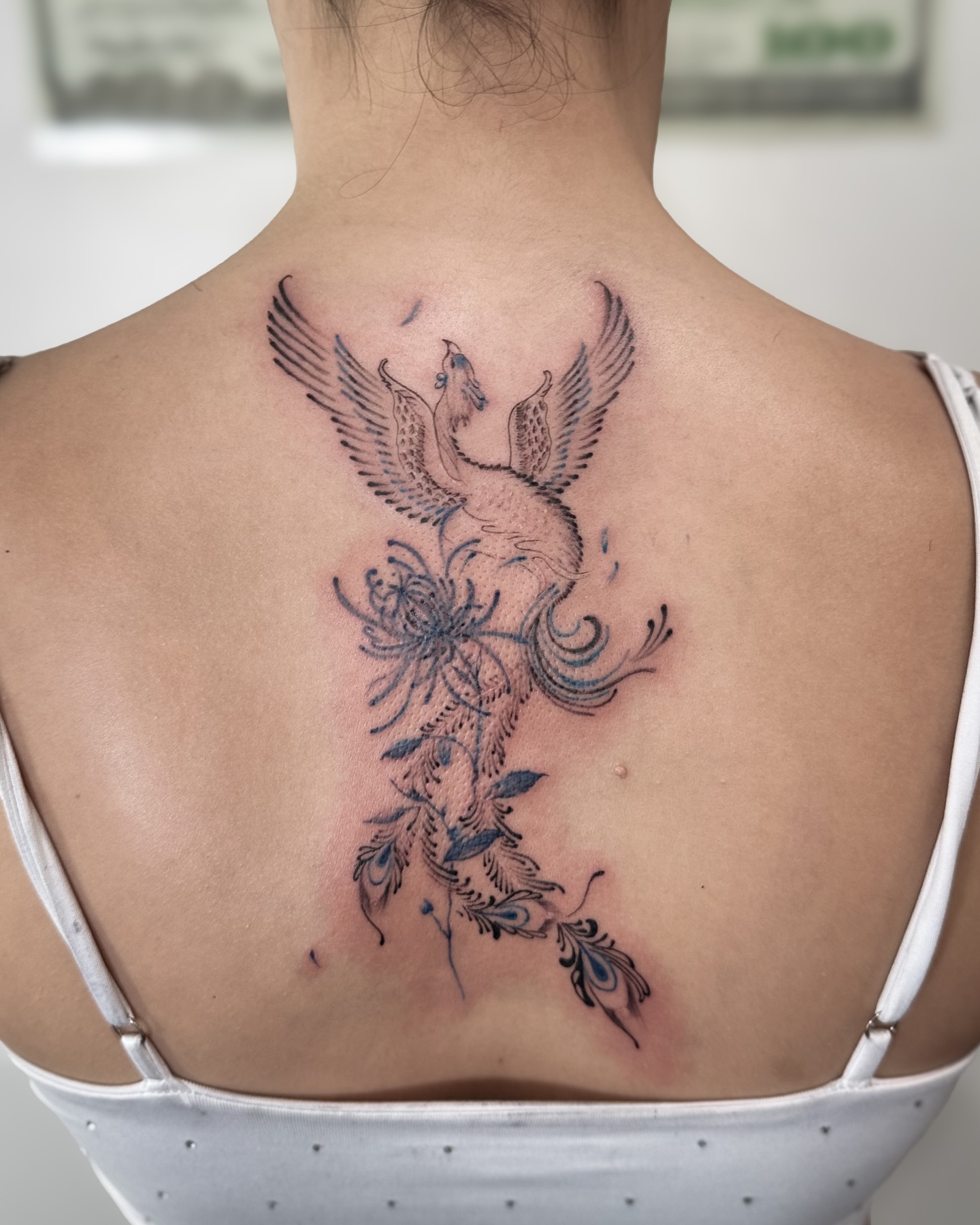 Phoenix back tattoo
