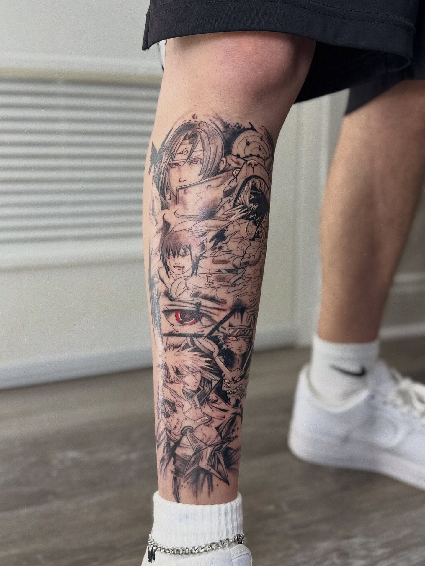 Anime leg sleeve tattoo